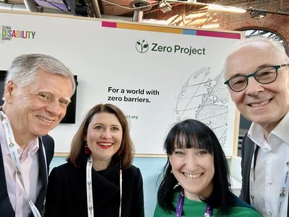 Michael, Anna, Margaret, and Martin smiling into the camera for a selfie at GDS