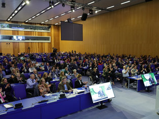 An aerial view of the entire audience in M1 conference room for the Award Ceremony of the Zero Project Conference 2023