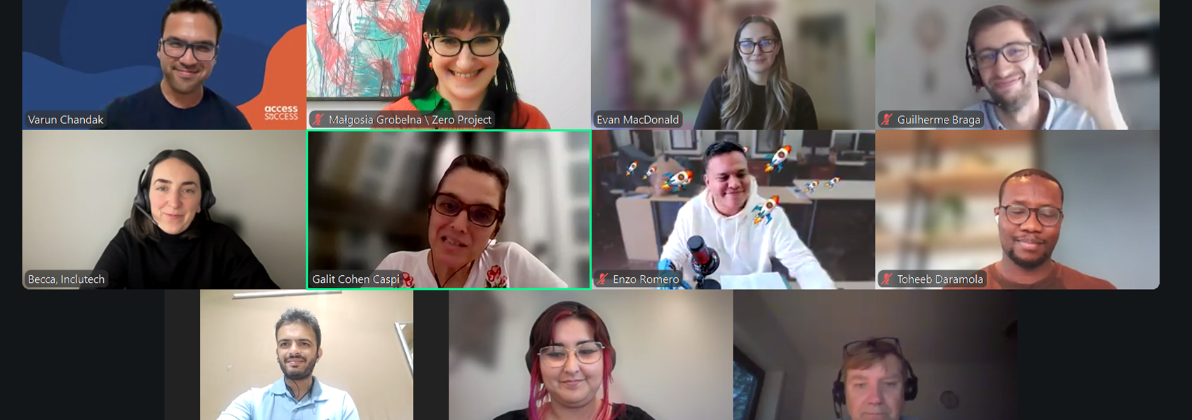 A screenshot of a virtual meeting with ten participants smiling and waving, each shown in individual video call windows. The participants’ names appear below their images.